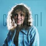 07-11-1976 Peter Frampton at studio in  Amsterdam, The Netherlands.

[keywords]Posed, Half Length, Smiling, Eyecontact[/keywords]